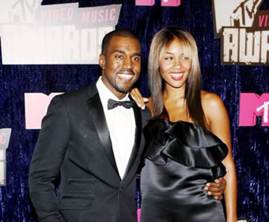Kanye West e Alexis Phifer (foto Lusa)