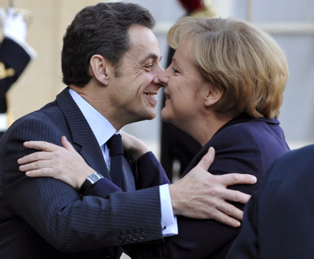 Nicolas Sarkozy e Angela Merkel