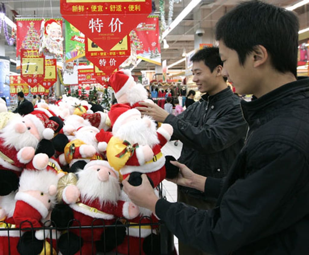 Comerciantes na cidade chinesa de Dongguan (EPA/ALEX HOFFORD)