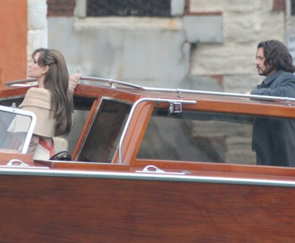 Angelina Jolie e Johnny Depp em Veneza (foto: Lusa/Epa)