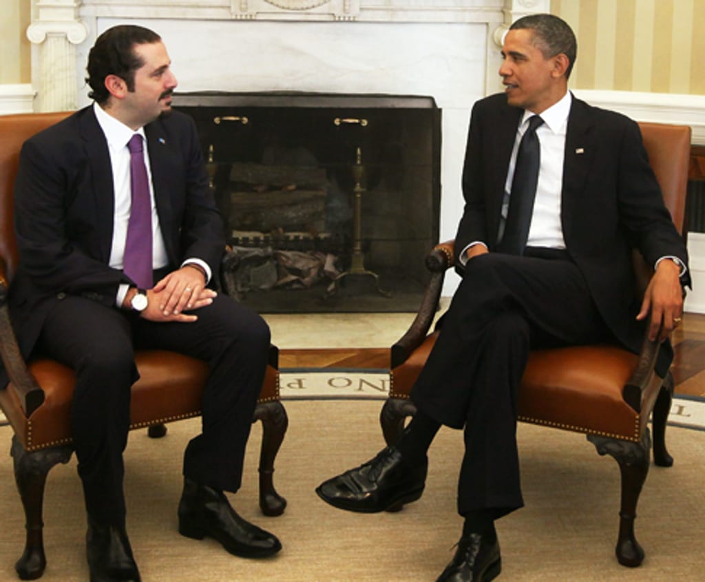 Saad Hariri com Barack Obama no dia em que 11 ministros do Líbano se demitiram ( EPA/Alex Wong)