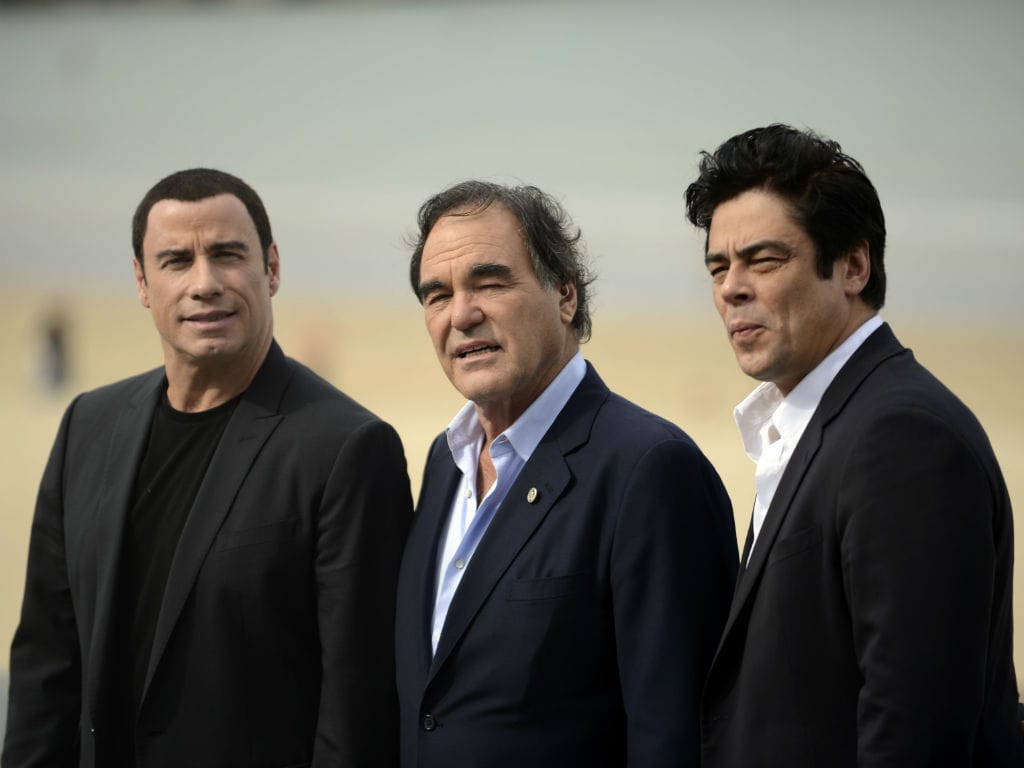 Travolta, Benicio e Oliver Stone (Foto Reuters)
