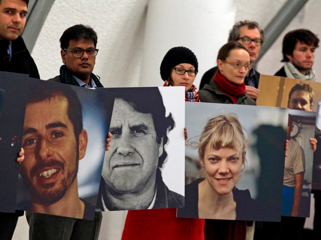 Manifestação a apoio aos ativistas da Greenpeace detidos em Moscovo durante a cimeira do clima de Varsóvia (Reuters)
