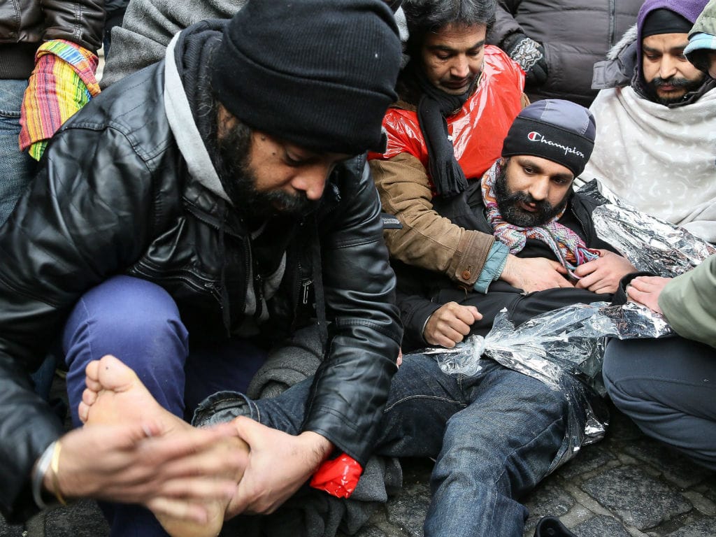 A marcha dos afegãos que pedem asilo na Bélgica (EPA/LUSA)