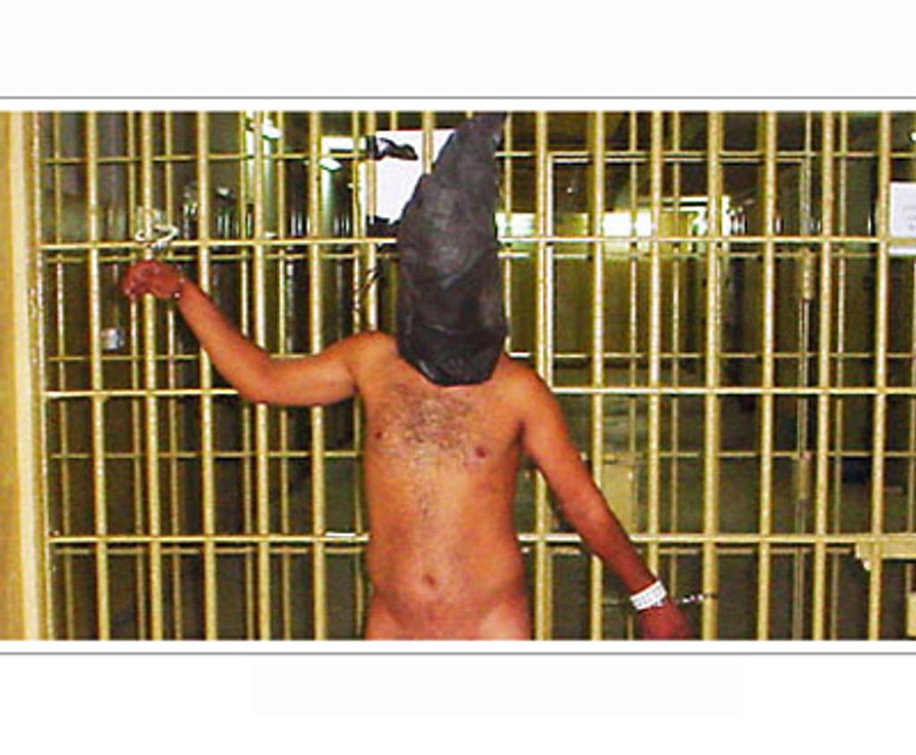Fotografia do Washington Post: Homen torturado na prisão de Abu Ghraib em Bagdad