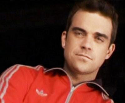 Robbie Williams mantém a forma com sexo - TVI