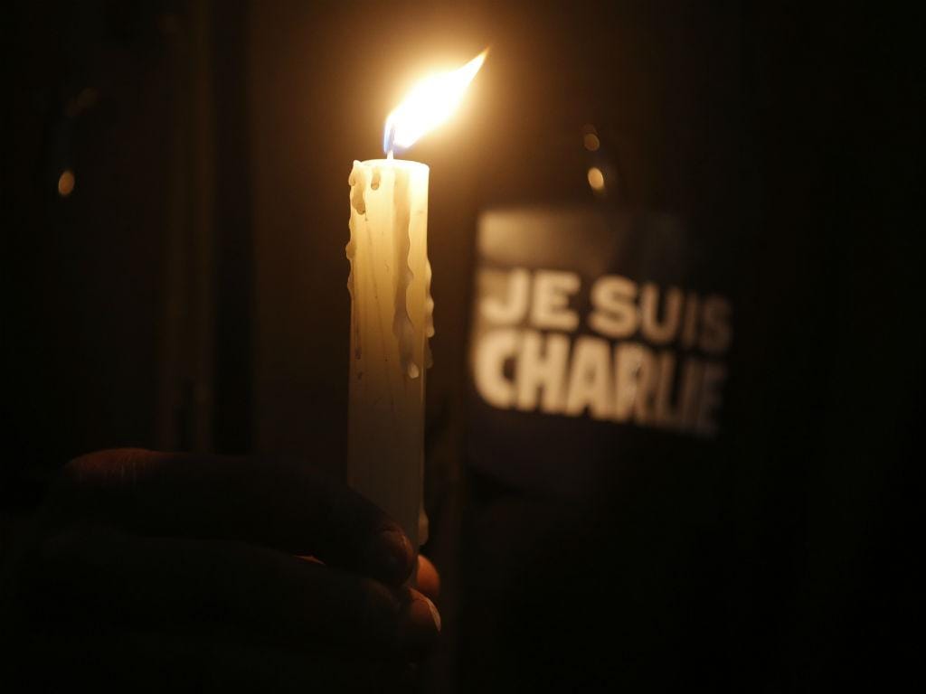 Homenagem às vítimas do ataque ao «Charlie Hebdo» (REUTERS)