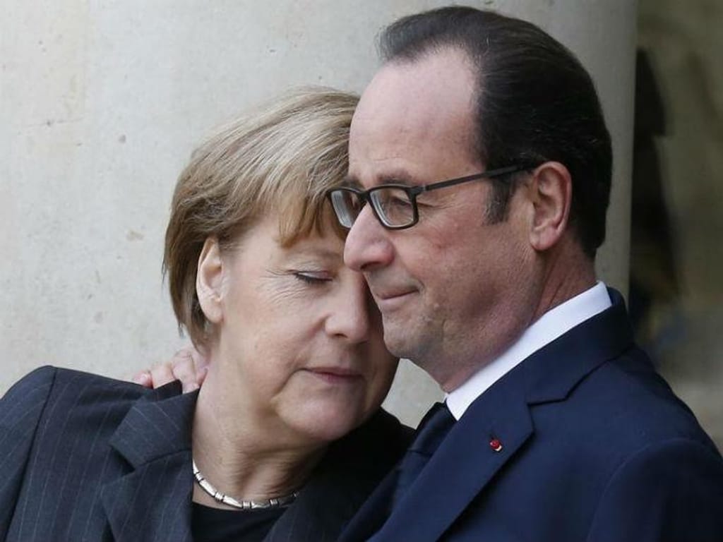 Angela Merkel e François Hollande na marcha de solidariedade em Paris (Reuters)