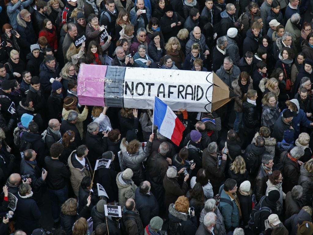 Milhares na marcha de solidariedade em Paris (Reuters)