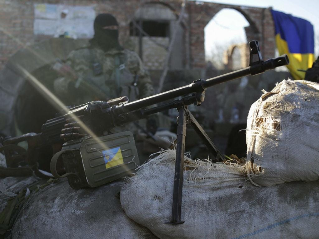 Exército ucraniano perto de Luhansk. EPA/ANASTASIA VLASOVA
