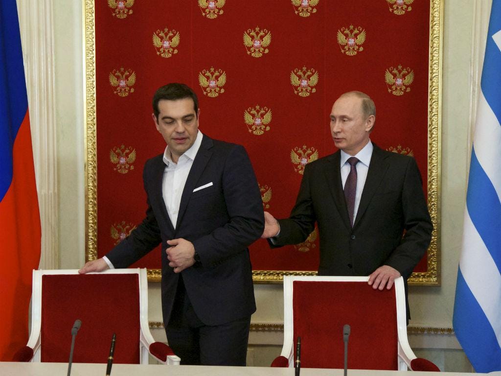 Alexis Tsipras e Vladimir Putin no Kremlin, em Moscovo, na Rússia. EPA/ALEXANDER ZEMLIANICHENKO