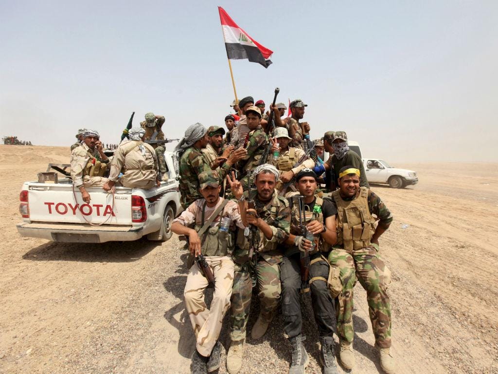 Milícias paramilitares xiitas pró-Governo iraquiano na província de Anbar (Reuters) 