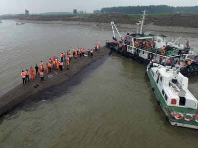 China: sobe para 65 o número de mortos no naufrágio - TVI