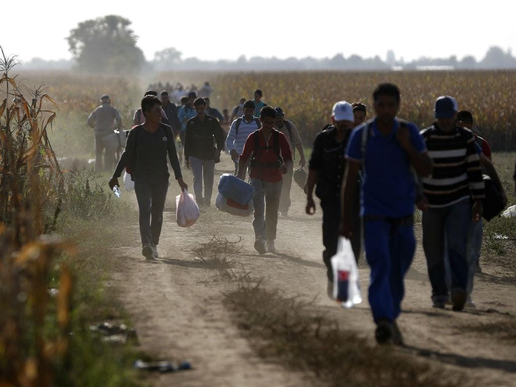Migrantes e refugiados (Reuters)