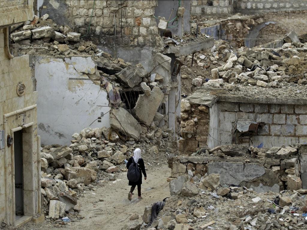 Escola bombardeada na Síria volta a abrir portas(REUTERS/Khalil Ashawi)