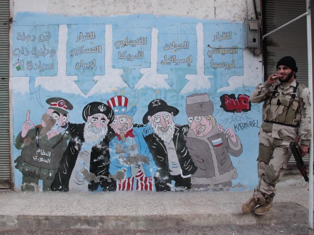 Mural contra o regime de Bashar al-Assad em Kafranbel, Síria