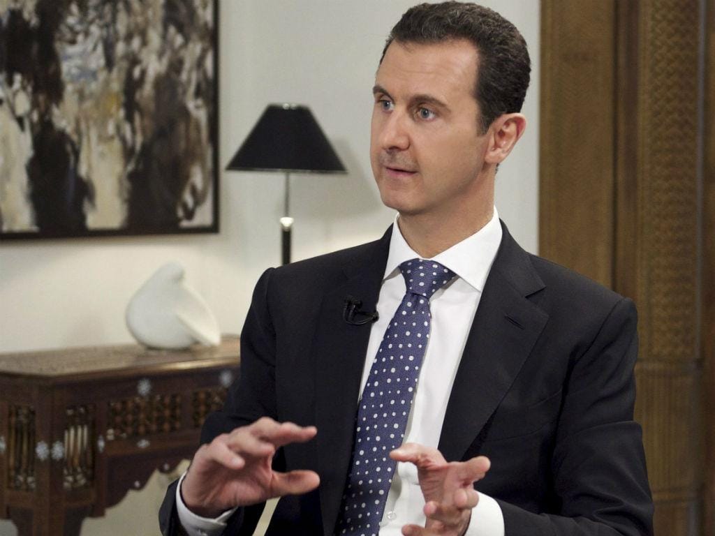 Bashar al Assad em entrevista à agência EFE (EPA/Lusa)