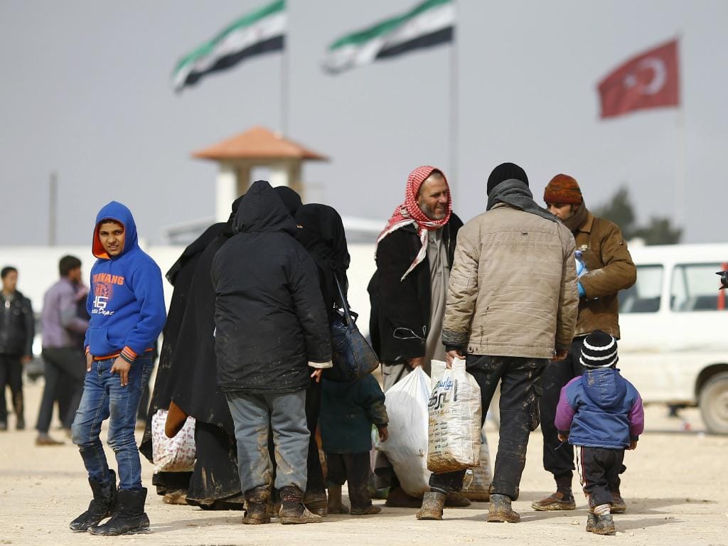 Refugiados sírios na fronteira com a Turquia