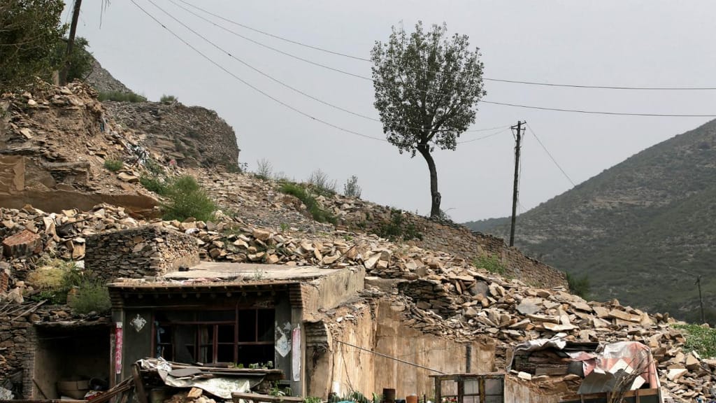 Solos exaustos pela exploração mineira estão a destruir várias localidades na china 