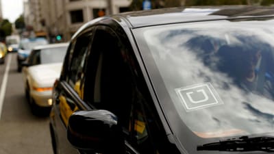Cerca de cem carros da Uber em marcha lenta contra redução de preços - TVI