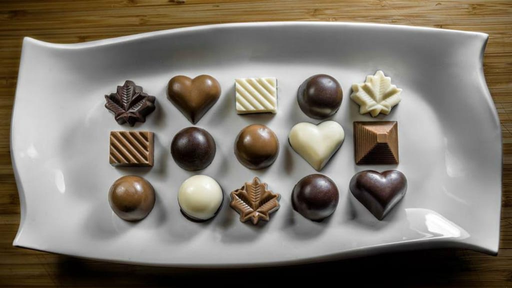Família de sírios são mestres de chocolates