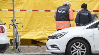 Duas pessoas mortas a tiro junto a banco em Zurique - TVI