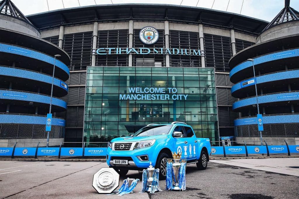 Nissan e Manchester City