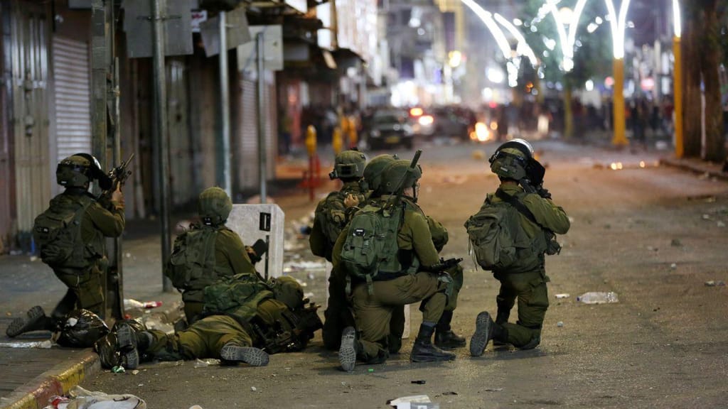 Confrontos entre palestinianos e o exército israelita em Hebron, na Cisjordânia