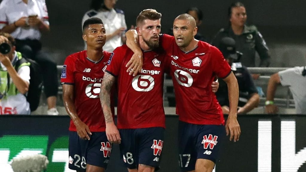 Xeka festeja com Yilmaz e Reinildo o golo que deu a Supertaça ao Lille (Atef Safadi/EPA)
