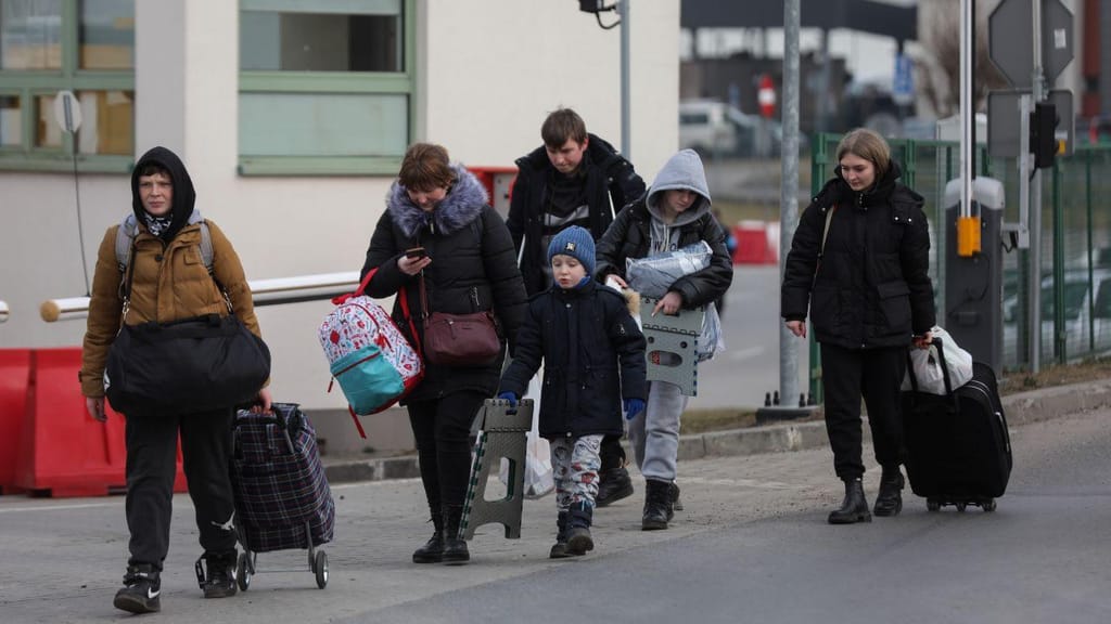 Refugiados ucranianos chegam à Polónia (Miguel A. Lopes/ EPA)