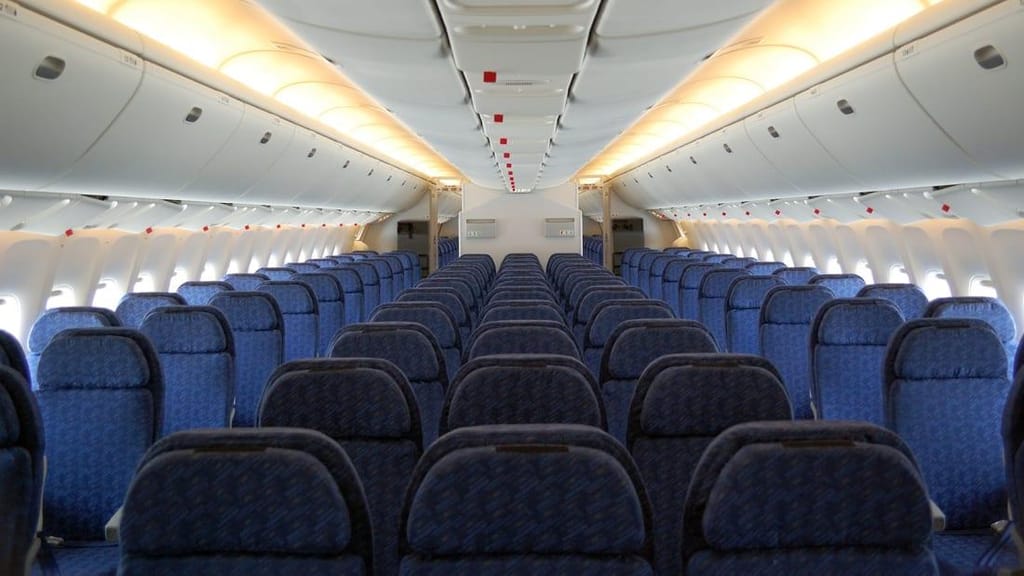 O interior de um avião. Créditos: Dmitriy/Adobe Stock