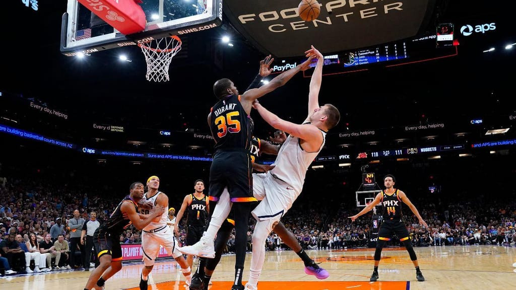 Phoenix Suns-Denver Nuggets (AP Photo/Matt York)