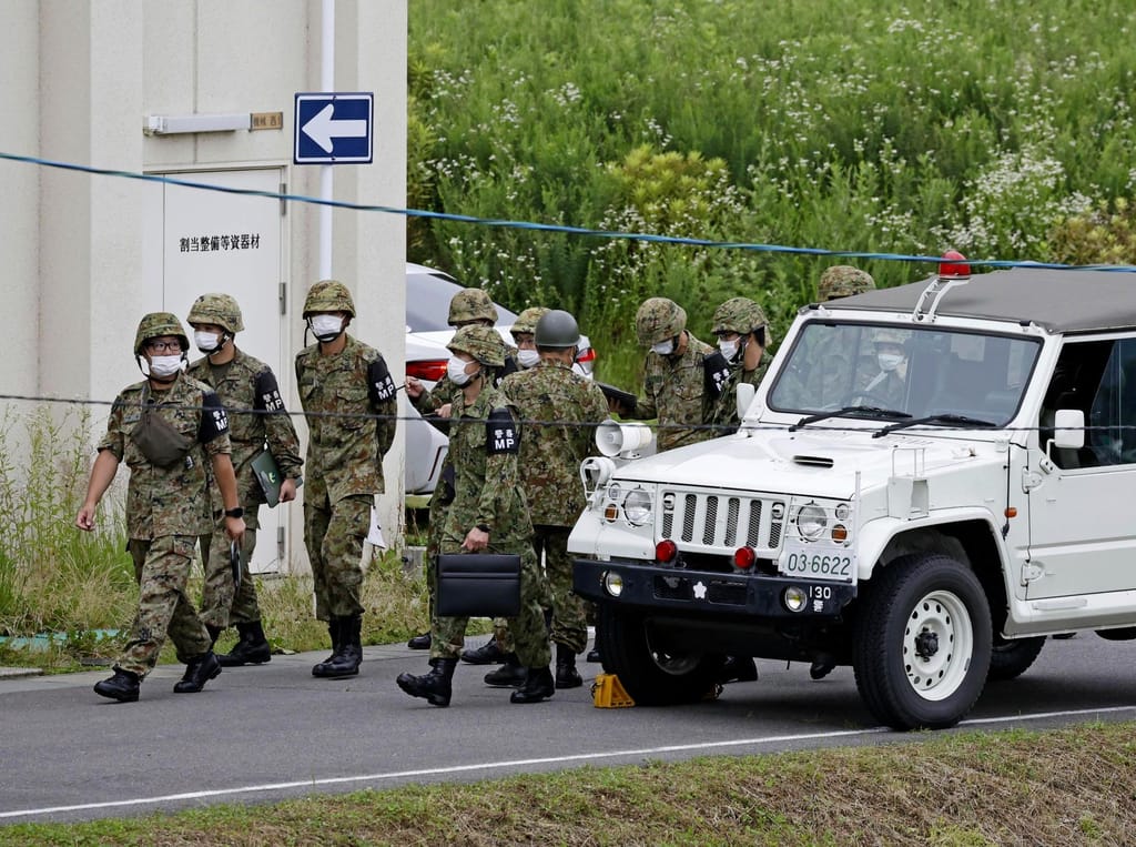 Tiroteio em centro de treino do exército japonês (Foto: Kyodo News via AP)
