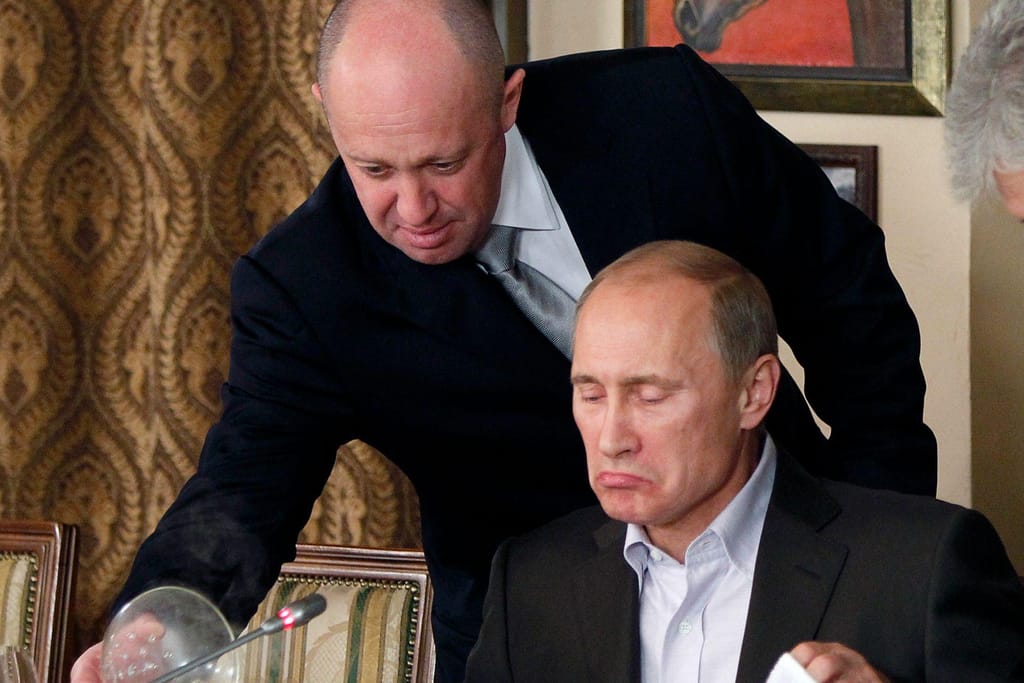 Vladimir Putin e Yevgeny Prigozhin (AP)