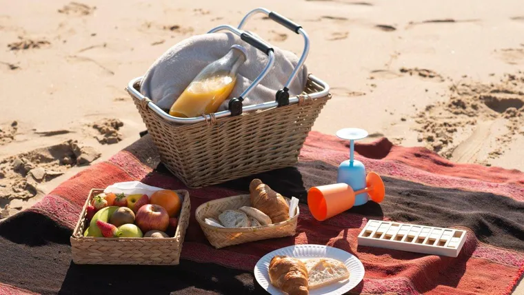 Picnic na praia Foto PHC.vector, Freepik