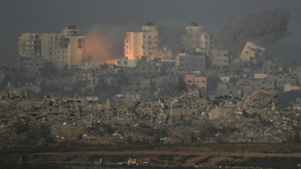 Fumo na Faixa de Gaza após ataques israelitas e momentos antes do cessar-fogo (AP)